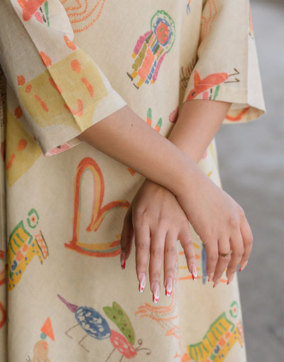 Creamy Quirky Swing Dress