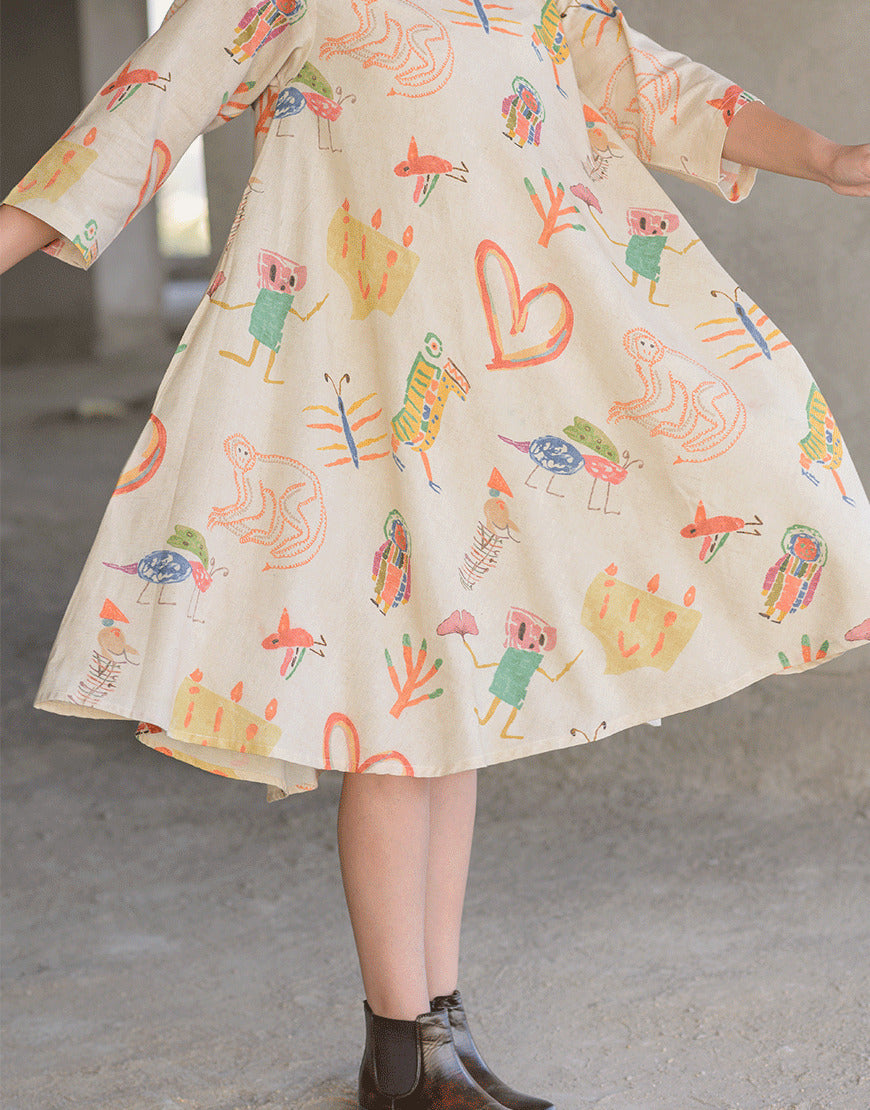 Creamy Quirky Swing Dress